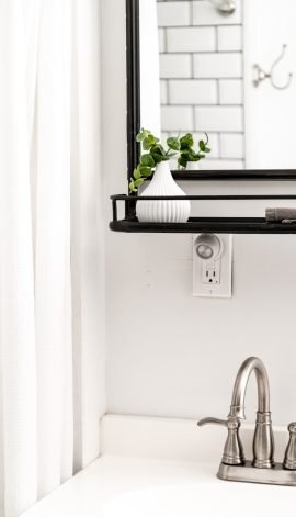 white ceramic sink with faucet